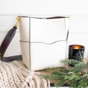 AALLYN Jordan Leather Bucket Crossbody Bag Cream Gold Structured Minimalist